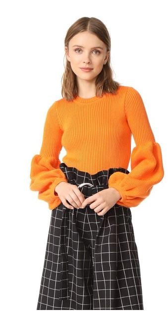 Ksenia-Schnaider-Orange-Puff-sleeve-sweater